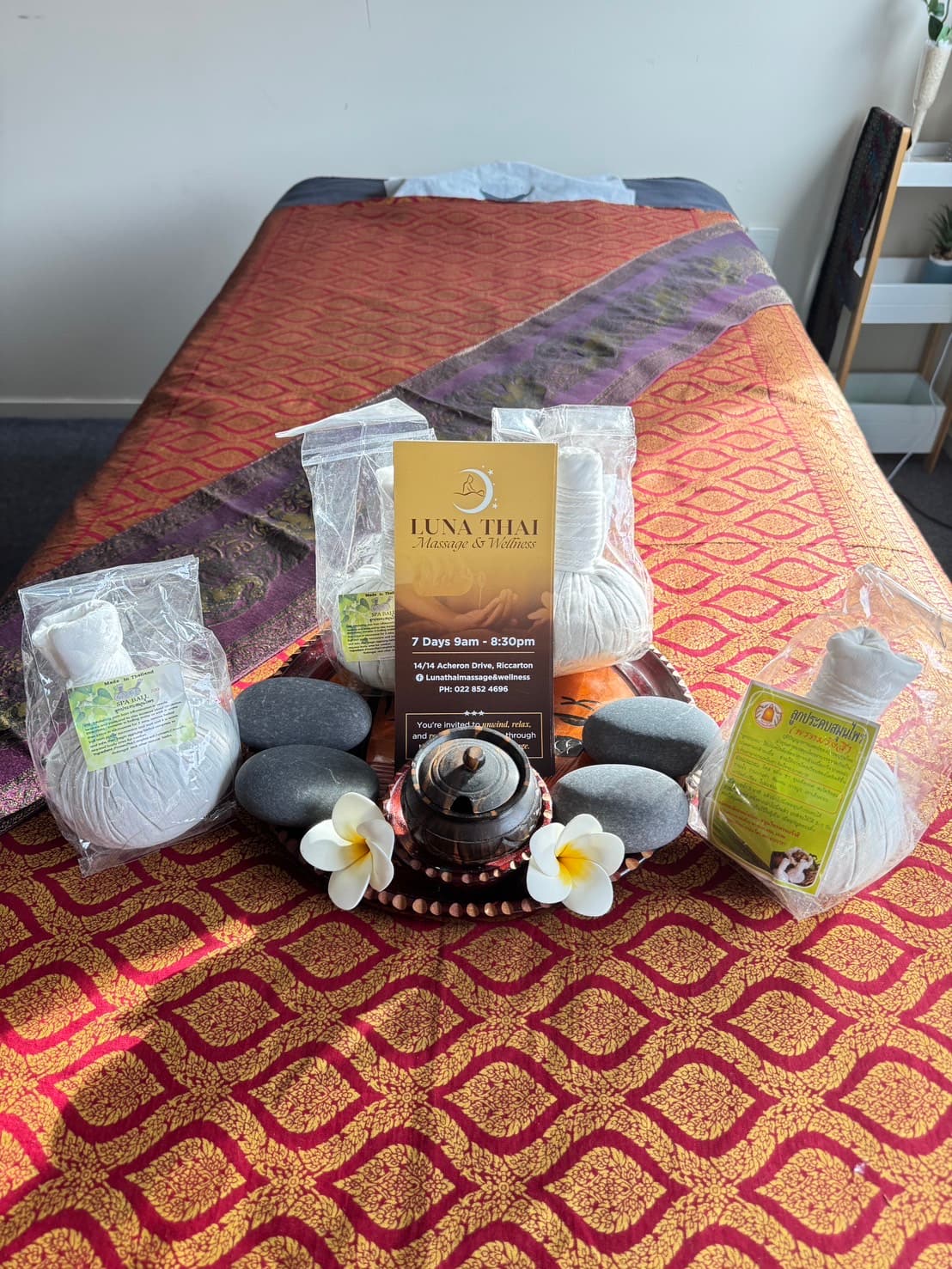 Hot stones and herbal compress
